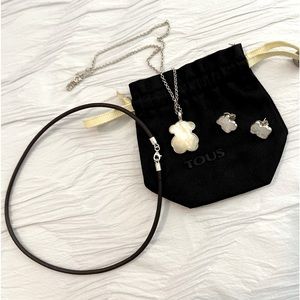 Tous leather chocker, mother of pearl pendant, chain & earrings (all for $88)